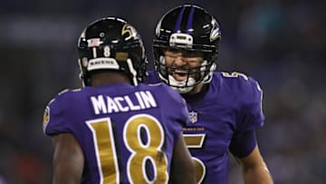 BALTIMORE, MD - OCTOBER 26: Quarterback Joe Flacco #5 and wide receiver Jeremy Maclin #18 of the Baltimore Ravens celebrate after a first quarter touchdown against the Miami Dolphins at M&T Bank Stadium on October 26, 2017 in Baltimore, Maryland. (Photo by Patrick Smith/Getty Images)