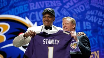 CHICAGO, IL - APRIL 28: Ronnie Stanley of Notre Dame holds up a jersey with NFL Commissioner Roger Goodell after being picked #6 overall by the Baltimore Ravens during the first round of the 2016 NFL Draft at the Auditorium Theatre of Roosevelt University on April 28, 2016 in Chicago, Illinois. (Photo by Jon Durr/Getty Images)