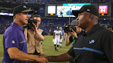 BALTIMORE, MD - AUGUST 27: Head coach Jim Caldwell of the Detroit Lions (R) shakes hands with head coach John Harbaugh of the Baltimore Ravens after their preseason game at M