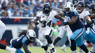 NASHVILLE, TN - NOVEMBER 05: Alex Collins #34 of the Baltimore Ravens runs with the ball against the Tennessee Titans during the first half at Nissan Stadium on November 5, 2017 in Nashville, Tennessee. (Photo by Andy Lyons/Getty Images)