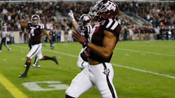 COLLEGE STATION, TX - NOVEMBER 11: Christian Kirk #3 of the Texas A&M Aggies runs back a punt for a 90 yard touchdown in the second quarter as Coltin Gerhart #11 of the New Mexico Lobos is unable to catch him at Kyle Field on November 11, 2017 in College Station, Texas. (Photo by Bob Levey/Getty Images)