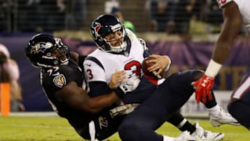 BALTIMORE, MD - NOVEMBER 27: Quarterback Tom Savage #3 of the Houston Texans is sacked by outside linebacker Terrell Suggs #55 of the Baltimore Ravens in the second quarter at M&T Bank Stadium on November 27, 2017 in Baltimore, Maryland. (Photo by Scott Taetsch/Getty Images)