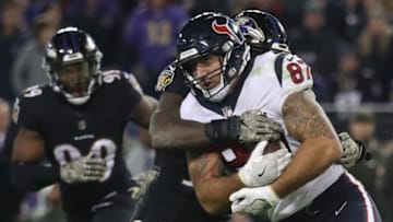 BALTIMORE, MD - NOVEMBER 27: Tight End C.J. Fiedorowicz #87 of the Houston Texans is tackled as he carries the ball in the fourth quarter against the Baltimore Ravens at M&T Bank Stadium on November 27, 2017 in Baltimore, Maryland. (Photo by Rob Carr/Getty Images)