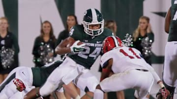 EAST LANSING, MI - AUGUST 29: Running back Gerald Holmes