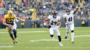 GREEN BAY, WI - NOVEMBER 19: Marlon Humphrey #29 of the Baltimore Ravens runs for yards after intercepting a pass during the second half of a game against the Green Bay Packers at Lambeau Field on November 19, 2017 in Green Bay, Wisconsin. (Photo by Stacy Revere/Getty Images)