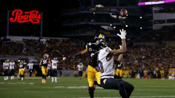 PITTSBURGH, PA - DECEMBER 10: Chris Moore #10 of the Baltimore Ravens makes a catch for a 30 yard touchdown reception while being defended by Sean Davis #28 of the Pittsburgh Steelers in the second quarter during the game at Heinz Field on December 10, 2017 in Pittsburgh, Pennsylvania. (Photo by Justin K. Aller/Getty Images)