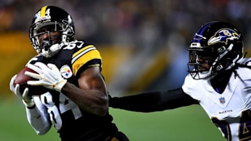 Pittsburgh Steelers makes a catch while being defended by Brandon Carr #24 of the Baltimore Ravens in the second quarter during the game at Heinz Field on December 10, 2017 in Pittsburgh, Pennsylvania. (Photo by Joe Sargent/Getty Images)