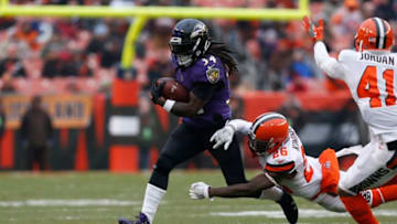 CLEVELAND, OH - DECEMBER 17: Alex Collins #34 of the Baltimore Ravens runs the ball in the second half against the Cleveland Browns at FirstEnergy Stadium on December 17, 2017 in Cleveland, Ohio. (Photo by Kirk Irwin/Getty Images)
