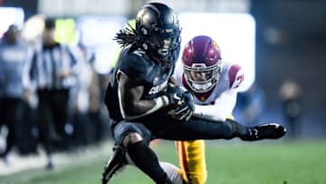 BOULDER, CO - OCTOBER 25: Laviska Shenault Jr. #2 of the Colorado Buffaloes is tackled after a catch by Isaiah Pola-Mao #21 of the USC Trojans in the second quarter of a game at Folsom Field on October 25, 2019 in Boulder, Colorado. (Photo by Dustin Bradford/Getty Images)