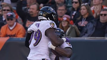 CINCINNATI, OHIO - NOVEMBER 10: Tyus Bowser #54 and Matt Judon #99 of the Baltimore Ravens celebrate after Bowser's touchdown during the NFL football game against the Cincinnati Bengals at Paul Brown Stadium on November 10, 2019 in Cincinnati, Ohio. (Photo by Bryan Woolston/Getty Images)