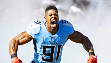 NASHVILLE, TN - NOVEMBER 10: Cameron Wake #91 of the Tennessee Titans runs onto the field with soldiers before a game against the Kansas City Chiefs at Nissan Stadium on November 10, 2019 in Nashville, Tennessee. The Titans defeated the Chiefs 35-32. (Photo by Wesley Hitt/Getty Images)