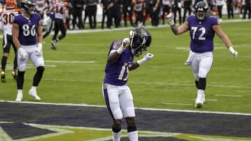 BALTIMORE, MD - OCTOBER 11: Marquise Brown #15 of the Baltimore Ravens celebrates after scoring a touchdown against the Cincinnati Bengals during the first half at M&T Bank Stadium on October 11, 2020 in Baltimore, Maryland. (Photo by Scott Taetsch/Getty Images)