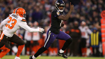 BALTIMORE, MARYLAND - DECEMBER 30: Quarterback Lamar Jackson #8 of the Baltimore Ravens reacts as he runs for a touchdown in the first quarter against the Cleveland Browns at M&T Bank Stadium on December 30, 2018 in Baltimore, Maryland. (Photo by Patrick Smith/Getty Images)