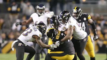 Dec 10, 2017; Pittsburgh, PA, USA; Baltimore Ravens strong safety Tony Jefferson (23) and cornerback Anthony Levine (41) and outside linebacker Terrell Suggs (55) combine on a sack of Pittsburgh Steelers quarterback Ben Roethlisberger (7) during the second quarter at Heinz Field. Mandatory Credit: Charles LeClaire-USA TODAY Sports
