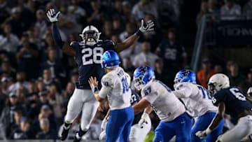 Sep 7, 2019; University Park, PA, USA; Penn State Nittany Lions defensive end Jayson Oweh (28) pressures Buffalo Bulls quarterback Matt Myers (10) during the third quarter at Beaver Stadium. Penn State defeated Buffalo 45-13. Mandatory Credit: Matthew O'Haren-USA TODAY Sports
