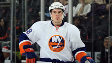 NEWARK, NJ - DECEMBER 23: Jesse Joensuu #58 of the New York Islanders skates against the New Jersey Devils at the Prudential Center on December 23, 2010 in Newark, New Jersey. The Isles defeated the Devils 5-1. (Photo by Jim McIsaac/Getty Images)