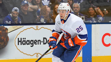TORONTO, ON - DECEMBER 29: Devon Toews #25 of the New York Islanders skates against the Toronto Maple Leafs during an NHL game at Scotiabank Arena on December 29, 2018 in Toronto, Ontario, Canada. The Islanders defeated the Maple Leafs 4-0.(Photo by Claus Andersen/Getty Images)