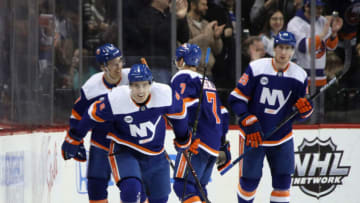 NEW YORK, NEW YORK - FEBRUARY 09: Ryan Pulock #6 of the New York Islanders returns to the bench after scoring the go-ahead goal at 13:57 of the third period against the Colorado Avalanche at the Barclays Center on February 09, 2019 in the Brooklyn borough of New York City. (Photo by Bruce Bennett/Getty Images)