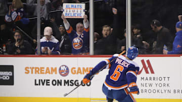 NEW YORK, NEW YORK - FEBRUARY 09: Ryan Pulock #6 of the New York Islanders celebrates his game winning goal at 2:23 of overtime against the Colorado Avalanche at the Barclays Center on February 09, 2019 in the Brooklyn borough of New York City. The Islanders defeated the Avalanche 4-3. (Photo by Bruce Bennett/Getty Images)