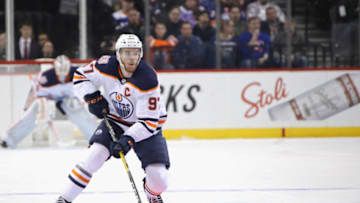 NEW YORK, NEW YORK - FEBRUARY 16: Connor McDavid #97 of the Edmonton Oilers skates against the New York Islanders at the Barclays Center on February 16, 2019 in the Brooklyn borough of New York City. The Islanders defeated the Oilers 5-2. (Photo by Bruce Bennett/Getty Images)