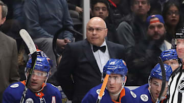 UNIONDALE, NEW YORK - MARCH 09: Barry Trotz of the New York Islanders sports a bowtie in honor of Bill Torrey during the game between the New York Islanders and the Philadelphia Flyers at NYCB Live's Nassau Coliseum on March 09, 2019 in Uniondale, New York. (Photo by Bruce Bennett/Getty Images)