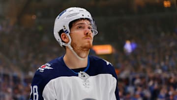 ST. LOUIS, MO - APRIL 20: Jack Roslovic #28 of the Winnipeg Jets reacts after allowing the St. Louis Blues to score a third goal in Game Six of the Western Conference First Round during the 2019 NHL Stanley Cup Playoffs at the Enterprise Center on April 20, 2019 in St. Louis, Missouri. (Photo by Dilip Vishwanat/Getty Images)