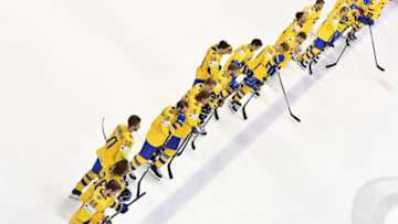 Sweden's players line up after the IIHF Men's Ice Hockey World Championships quarter-final match between Finland and Sweden on May 23, 2019 at the Steel Arena in Kosice, Slovakia. (Photo by JOE KLAMAR / AFP) (Photo credit should read JOE KLAMAR/AFP via Getty Images)