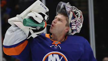 UNIONDALE, NEW YORK - OCTOBER 04: Semyon Varlamov #40 of the New York Islanders takes a first period water break during the game against the Washington Capitals at NYCB Live's Nassau Coliseum on October 04, 2019 in Uniondale, New York. (Photo by Bruce Bennett/Getty Images)