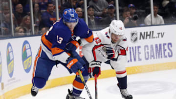 UNIONDALE, NEW YORK - OCTOBER 04: Mathew Barzal #13 of the New York Islanders skates against Martin Fehervary #42 of the Washington Capitals during the second period at NYCB Live's Nassau Coliseum on October 04, 2019 in Uniondale, New York. (Photo by Bruce Bennett/Getty Images)