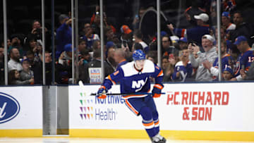 NEW YORK, NEW YORK - OCTOBER 08: Noah Dobson #8 of the New York Islanders leads the team out for warm-ups prior to playing in his first NHL game against the Edmonton Oilers at NYCB's LIVE Nassau Coliseum on October 08, 2019 in Uniondale, New York. As part of the rookie initiation, the rest of the team gives the player a few laps before they join him. (Photo by Bruce Bennett/Getty Images)