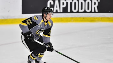 BOISBRIAND, QC - NOVEMBER 17: Samuel Bolduc #58 of the Blainville-Boisbriand Armada skates the puck against the Drummondville Voltiguers during the first period at Centre d'Excellence Sports Rousseau on November 17, 2019 in Boisbriand, Canada. The Blainville-Boisbriand Armada defeated the Drummondville Voltiguers 4-3. (Photo by Minas Panagiotakis/Getty Images)