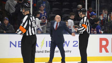 UNIONDALE, NEW YORK - MARCH 07: Barry Trotz the head coach of the New York Islanders argues the overtime goal as the Islanders were defeated by the Carolina Hurricanes at NYCB Live's Nassau Coliseum on March 07, 2020 in Uniondale, New York. The Hurricanes defeated the Islanders 3-2 in overtime. (Photo by Bruce Bennett/Getty Images)