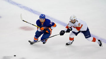 Colton Sceviour #7 of the Florida Panthers skates against Mathew Barzal #13 of the New York Islanders (Photo by Andre Ringuette/Freestyle Photo/Getty Images)