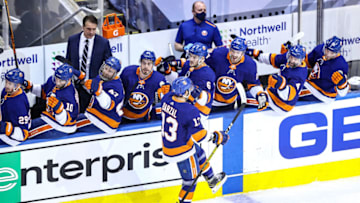 TORONTO, ONTARIO - AUGUST 18: Mathew Barzal #13 of the New York Islanders is congratulated by his teammates after scoring a goal at 9:16 against the Washington Capitals during the first period in Game Four of the Eastern Conference First Round during the 2020 NHL Stanley Cup Playoffs at Scotiabank Arena on August 18, 2020 in Toronto, Ontario. (Photo by Elsa/Getty Images)