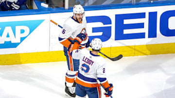 EDMONTON, ALBERTA - SEPTEMBER 15: Ryan Pulock #6 of the New York Islanders is congratulated by Nick Leddy #2 after scoring a goal against the Tampa Bay Lightning during the first period in Game Five of the Eastern Conference Final during the 2020 NHL Stanley Cup Playoffs at Rogers Place on September 15, 2020 in Edmonton, Alberta, Canada. (Photo by Bruce Bennett/Getty Images)