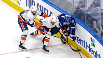 EDMONTON, ALBERTA - SEPTEMBER 15: Anthony Cirelli #71 of the Tampa Bay Lightning battles for the puck with Adam Pelech #3 and Ryan Pulock #6 of the New York Islanders during the first overtime period in Game Five of the Eastern Conference Final during the 2020 NHL Stanley Cup Playoffs at Rogers Place on September 15, 2020 in Edmonton, Alberta, Canada. (Photo by Bruce Bennett/Getty Images)