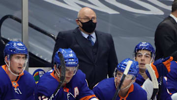 UNIONDALE, NEW YORK - JANUARY 21: Head coach Barry Trotz of the New York Islanders handle bench duties against the New Jersey Devils at Nassau Coliseum on January 21, 2021 in Uniondale, New York. (Photo by Bruce Bennett/Getty Images)