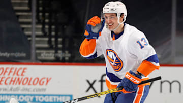 PHILADELPHIA, PENNSYLVANIA - JANUARY 31: Mathew Barzal #13 of the New York Islanders celebrates after scoring during the second period against the Philadelphia Flyers at Wells Fargo Center on January 31, 2021 in Philadelphia, Pennsylvania. (Photo by Tim Nwachukwu/Getty Images)