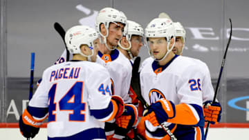 PITTSBURGH, PENNSYLVANIA - FEBRUARY 18: The New York Islanders celebrate a third period goal by Brock Nelson #29 against the Pittsburgh Penguins at PPG PAINTS Arena on February 18, 2021 in Pittsburgh, Pennsylvania. (Photo by Emilee Chinn/Getty Images)