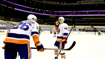 PITTSBURGH, PENNSYLVANIA - FEBRUARY 18: Jean-Gabriel Pageau #44 and Oliver Wahlstrom #26 of the New York Islanders during their game against the Pittsburgh Penguins at PPG PAINTS Arena on February 18, 2021 in Pittsburgh, Pennsylvania. (Photo by Emilee Chinn/Getty Images)