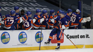 UNIONDALE, NEW YORK - FEBRUARY 28: Oliver Wahlstrom #26 of the New York Islanders celebrates in the first period goal against the Pittsburgh Penguins during their game at Nassau Coliseum on February 28, 2021 in Uniondale, New York. (Photo by Al Bello/Getty Images)