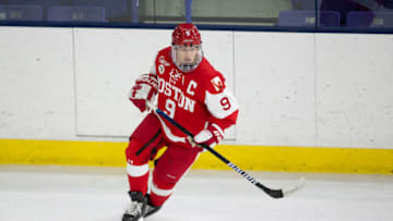 LOWELL, MA - MARCH 6: Logan Cockerill #9 of the Boston University Terriers skates against the Massachusetts Lowell River Hawks during NCAA men's hockey at the Tsongas Center on March 6, 2021 in Lowell, Massachusetts. The game ended in a 3-3 tie with the Terriers also winning an extra point in a shootout. (Photo by Richard T Gagnon/Getty Images)