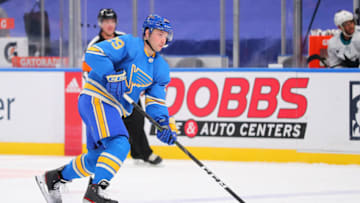 ST LOUIS, MO - FEBRUARY 20: Vince Dunn #29 of the St. Louis Blues skates against the San Jose Sharks at Enterprise Center on February 20, 2021 in St Louis, Missouri. (Photo by Dilip Vishwanat/Getty Images)
