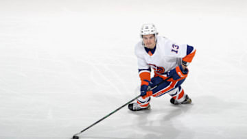 NEWARK, NEW JERSEY - MARCH 14: Mathew Barzal #13 of the New York Islanders skates against the New Jersey Devils at the Prudential Center on March 14, 2021 in Newark, New Jersey. (Photo by Bruce Bennett/Getty Images)