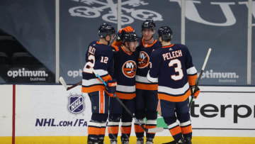 UNIONDALE, NEW YORK - MARCH 20: Anthony Beauvillier #18 of the New York Islanders celebrates his third period goal against the Philadelphia Flyers during their game at Nassau Coliseum on March 20, 2021 in Uniondale, New York. (Photo by Al Bello/Getty Images)