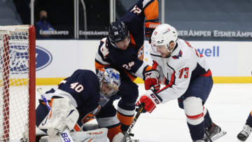 UNIONDALE, NEW YORK - APRIL 06: Semyon Varlamov #40 of the New York Islanders makes a save against Conor Sheary #73 of the Washington Capitals during their game at Nassau Coliseum on April 06, 2021 in Uniondale, New York. (Photo by Al Bello/Getty Images)