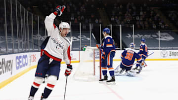 UNIONDALE, NEW YORK - APRIL 24: Evgeny Kuznetsov #92 of the Washington Capitals celebrates his goal at 7:35 of the third period against the New York Islanders at the Nassau Coliseum on April 24, 2021 in Uniondale, New York. (Photo by Bruce Bennett/Getty Images)