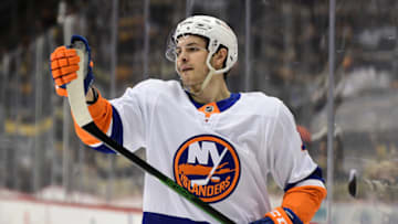 PITTSBURGH, PENNSYLVANIA - MAY 18: Mathew Barzal #13 of the New York Islanders looks at his stick during the third period in Game Two of the First Round of the 2021 Stanley Cup Playoffs against the Pittsburgh Penguins at PPG PAINTS Arena on May 18, 2021 in Pittsburgh, Pennsylvania. The Pittsburgh Penguins won 2-1. (Photo by Emilee Chinn/Getty Images)