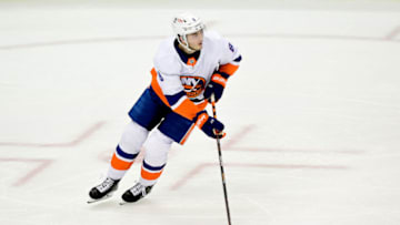 PITTSBURGH, PENNSYLVANIA - MAY 18: Noah Dobson #8 of the New York Islanders stickhandles the puck against the Pittsburgh Penguins during the second period in Game Two of the First Round of the 2021 Stanley Cup Playoffs at PPG PAINTS Arena on May 18, 2021 in Pittsburgh, Pennsylvania. (Photo by Emilee Chinn/Getty Images)