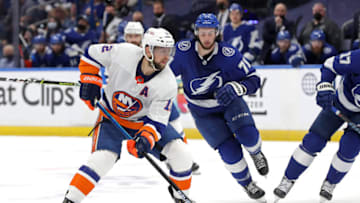 TAMPA, FLORIDA - JUNE 13: Josh Bailey #12 of the New York Islanders carries the puck against the Tampa Bay Lightning during the second period in Game One of the Stanley Cup Semifinals during the 2021 Stanley Cup Playoffs at Amalie Arena on June 13, 2021 in Tampa, Florida. (Photo by Mike Carlson/Getty Images)